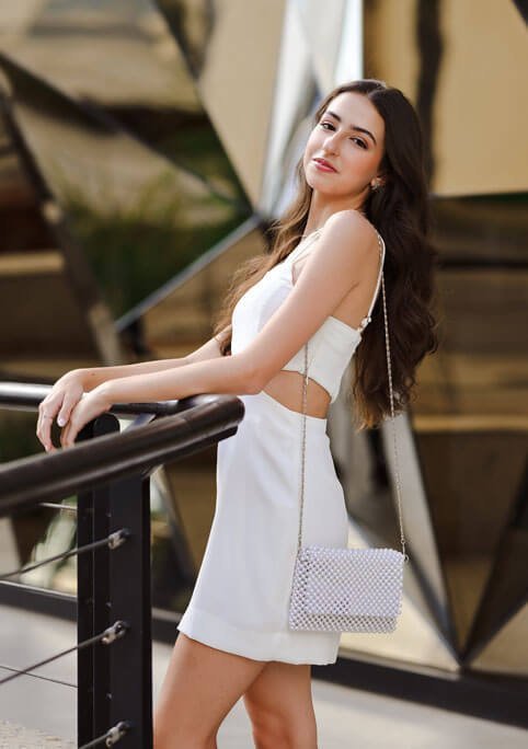 Stop worrying about the potholes in the road and enjoy the journey woman-joint-shoulder-smile-dress-flash-photography