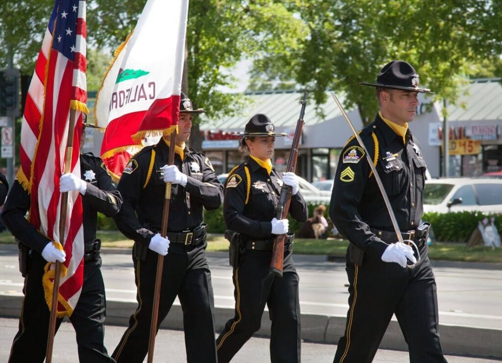 A change is brought about because ordinary people do extraordinary things military-usa-profession-parade-festival